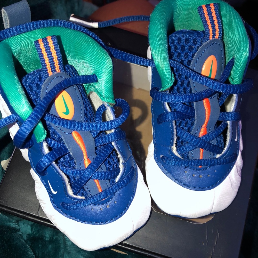 Blue and white Nike posite pro